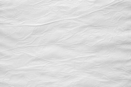 Blank white crumpled creased torn paper poster texture surface backgroundの写真素材