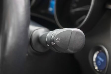 Car light control switch close up
