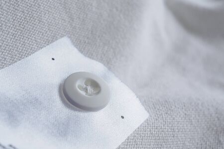 laundry care clothing label with button on cotton shirtの写真素材