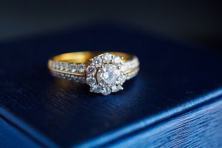 wedding gold diamond ring on jewelry boxの写真素材