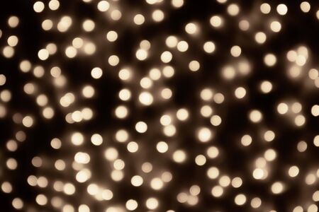 Abstract blur golden bokeh light Christmas holiday background