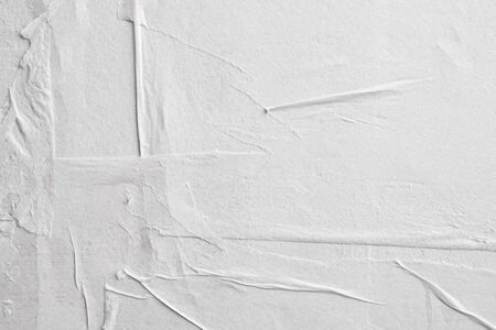 Blank white crumpled and creased paper poster texture background