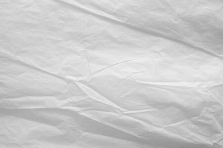 White crumpled paper abstract background textureの写真素材