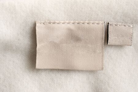laundry care clothing label on fabric texture