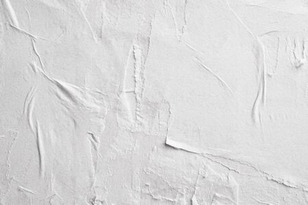 Blank white crumpled and creased paper poster texture backgroundの写真素材