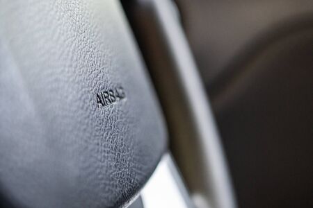 Safety airbag sign on car steering wheelの写真素材