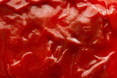Tomato sauce ketchup texture background close upの写真素材