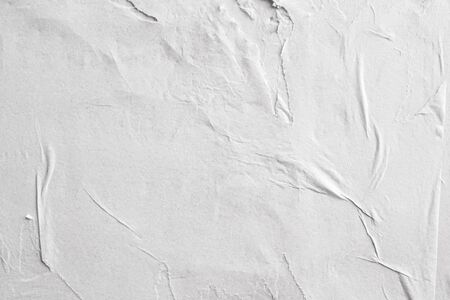 Blank white crumpled and creased paper poster texture background