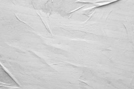 Blank white crumpled and creased paper poster texture background