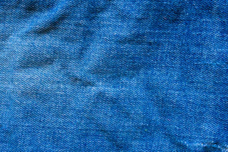 Denim blue jeans texture close up background top view