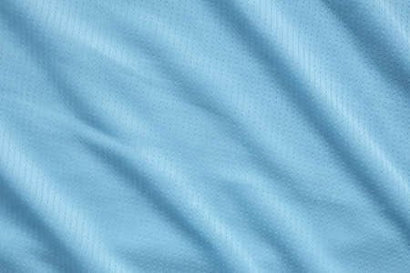 Blue football jersey clothing fabric texture sports wear backgroundの写真素材