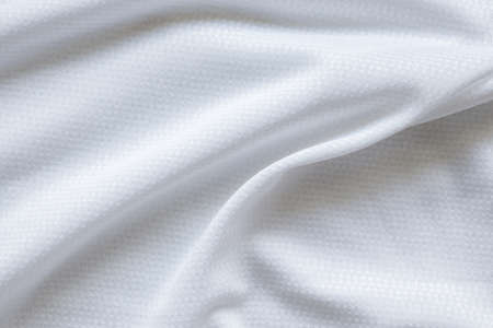White sports clothing fabric football shirt jersey texture backgroundの写真素材