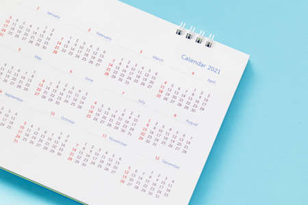 2021 calendar page on blue background business planning appointment meeting concept