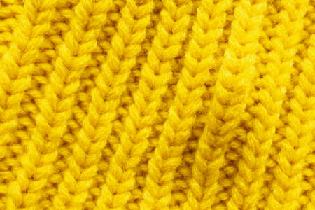 Yellow knitting wool texture background