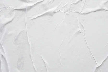 Blank white crumpled and creased paper poster texture background
