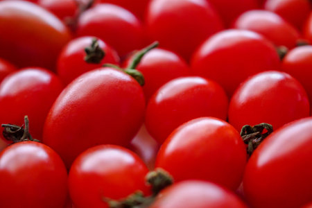 Red ripe organic tomato backgroundの写真素材