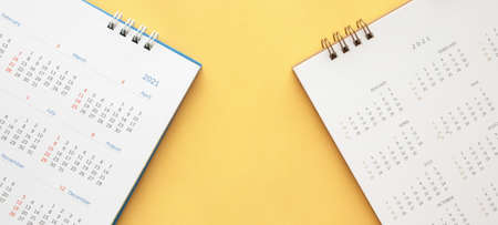 2021 calendar page on yellow color background business planning appointment meeting conceptの写真素材