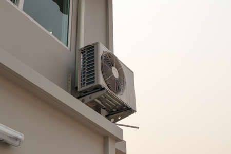 Air condition outdoor unit compressor install outside the houseの写真素材