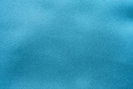 Blue fabric texture background close up