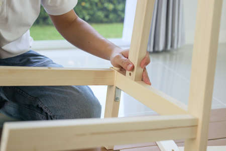 Assembly wooden furniture at home using screw allen