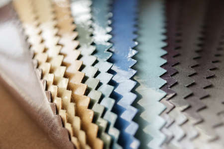 female designer with fabric color samples choosing textile for curtainsの写真素材