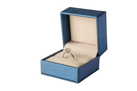 Diamond ring in jewelry gift box isolated on white background