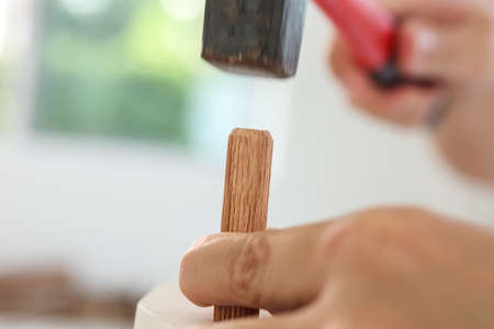 Man assembling furniture at home