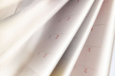 Abstract blur calendar page flipping sheet close up background business schedule planning appointment meeting conceptの写真素材