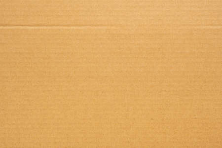 Brown eco recycled cardboard paper sheet texture backgroundの写真素材
