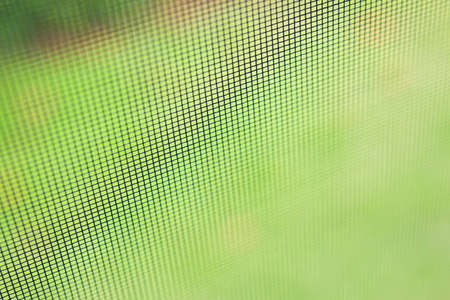 mosquito net wire screen on house window protection against insectの写真素材