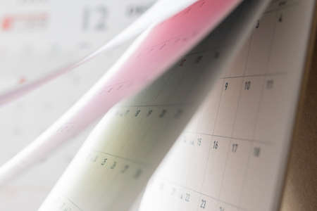 Abstract blur calendar page flipping sheet close up background business schedule planning appointment meeting conceptの写真素材