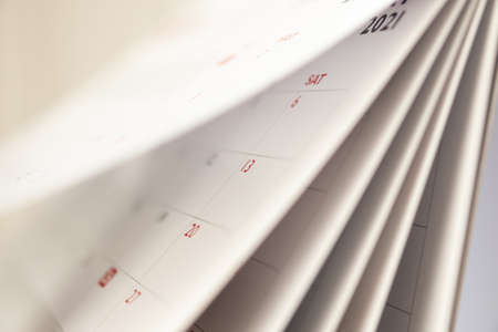 Abstract blur calendar page flipping sheet close up background business schedule planning...