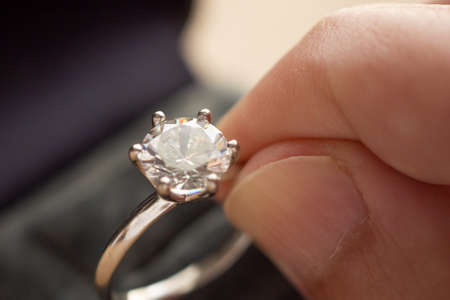 hand hold beautiful jewelry diamond ringの写真素材