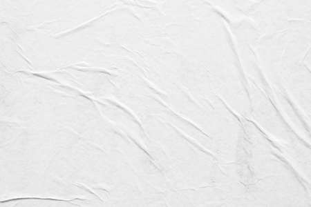 white crumpled and creased paper poster texture backgroundの写真素材