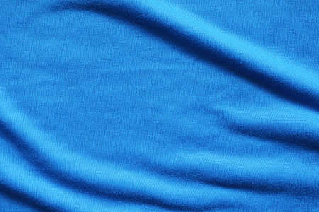 Blue football jersey clothing fabric texture sports wear backgroundの写真素材