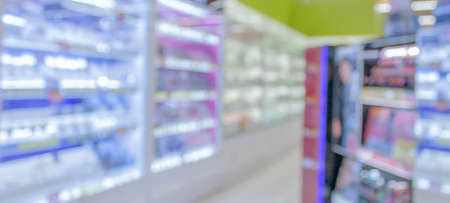 pharmacy drugstore shelves interior blurred abstract backgroundの写真素材