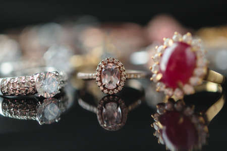 big red ruby ring with jewelry backgroundの写真素材