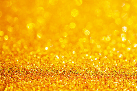 gold glitter sparkle with bokeh backgroundの写真素材