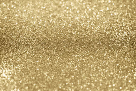 Abstract gold glitter sparkle texture backgroundの写真素材