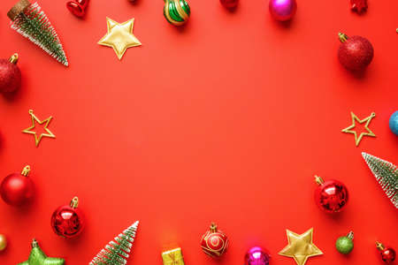 Christmas new year holiday background pine tree ball bauble on red background