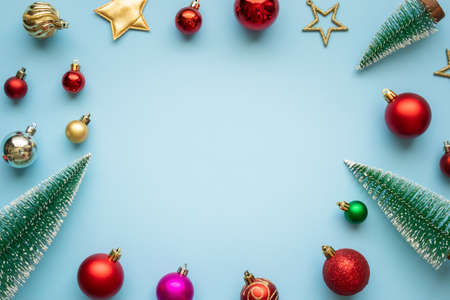 Christmas new year background pine tree ball bauble on blue pastel background