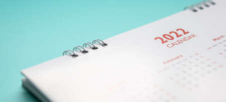 2022 calendar page on blue background business planning appointment meeting conceptの写真素材