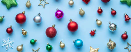 Christmas ball bauble pattern minimal flatlay on blue pastel background top viewの写真素材