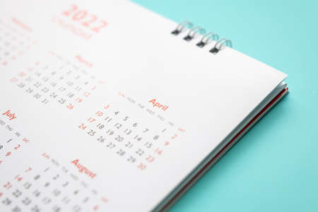 2022 calendar page on blue background business planning appointment meeting conceptの写真素材