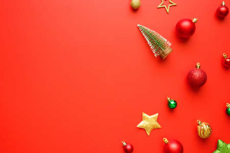 Christmas new year holiday background pine tree ball bauble on red background