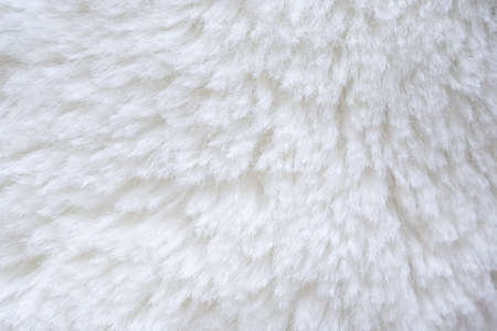 White fluffy fur fabric wool texture backgroundの写真素材