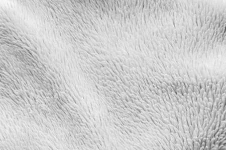 White fluffy fur fabric wool texture backgroundの写真素材