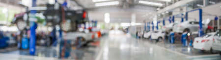 car service centre auto repair workshop blurred panoramic backgroundの写真素材
