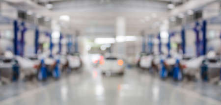 car service centre auto repair workshop blurred panoramic backgroundの写真素材
