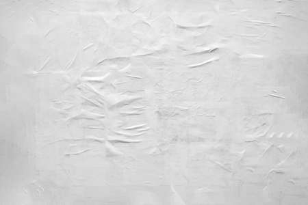 Blank white crumpled and creased paper poster textureの写真素材